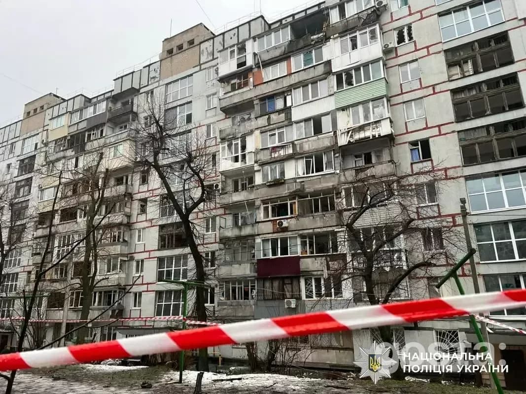 Destruction in Dnipro: residential building damaged by Russian attacks; emergency services and police respond.