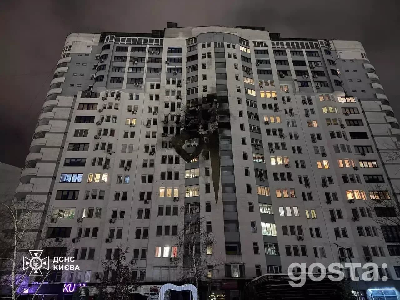 Destruction of a residential building in Kyiv following a Russian attack, highlighting emergency response efforts.