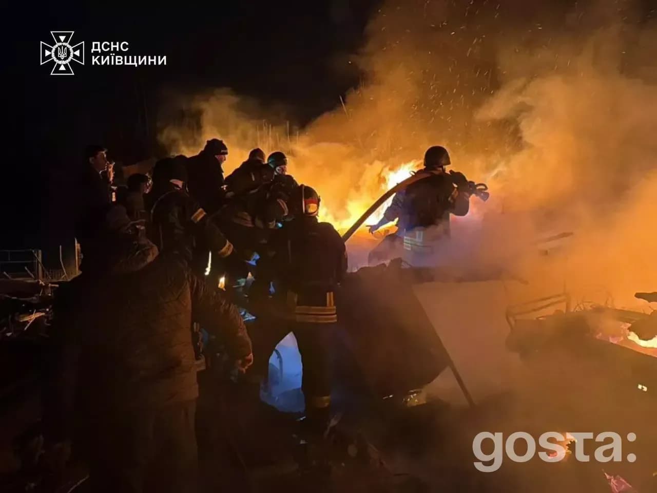 Rescue teams battle flames after Russian strikes, exemplifying their coordinated response to attacks on Ukraine's infras