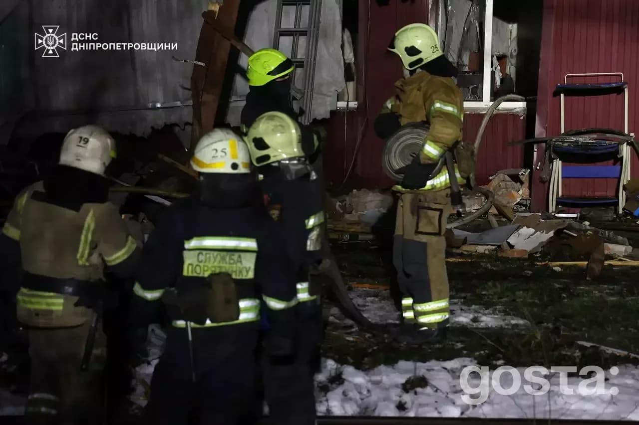 Rescue workers from Ukraine's State Emergency Service respond to devastating bombardment in Dnipro, aiding injured civil