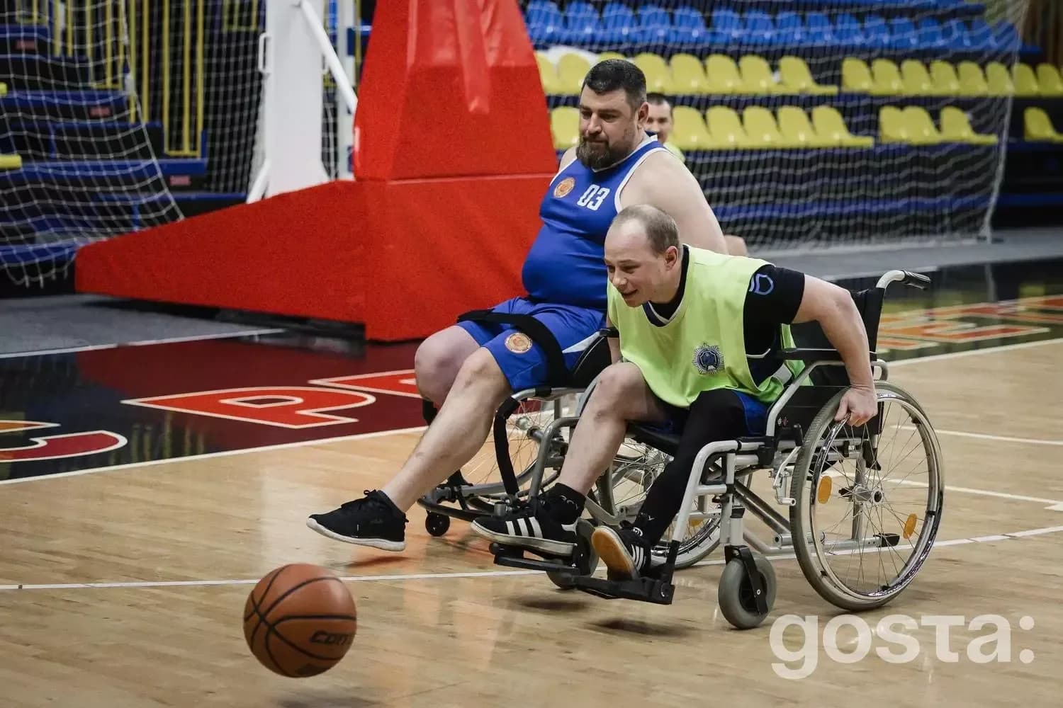 Veterans' Bask: Team members with disabilities practice adaptive basketball, showcasing resilience and unity in sport.